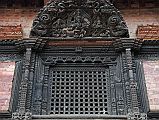 Kathmandu Bhaktapur 03-2 Bhaktapur Durbar Square Palace Of 55 Windows Close Up Here is a close up of one of the 55 beautifully carved windows in the Palace of 55 Windows in Bhaktapurs Durbar Square.